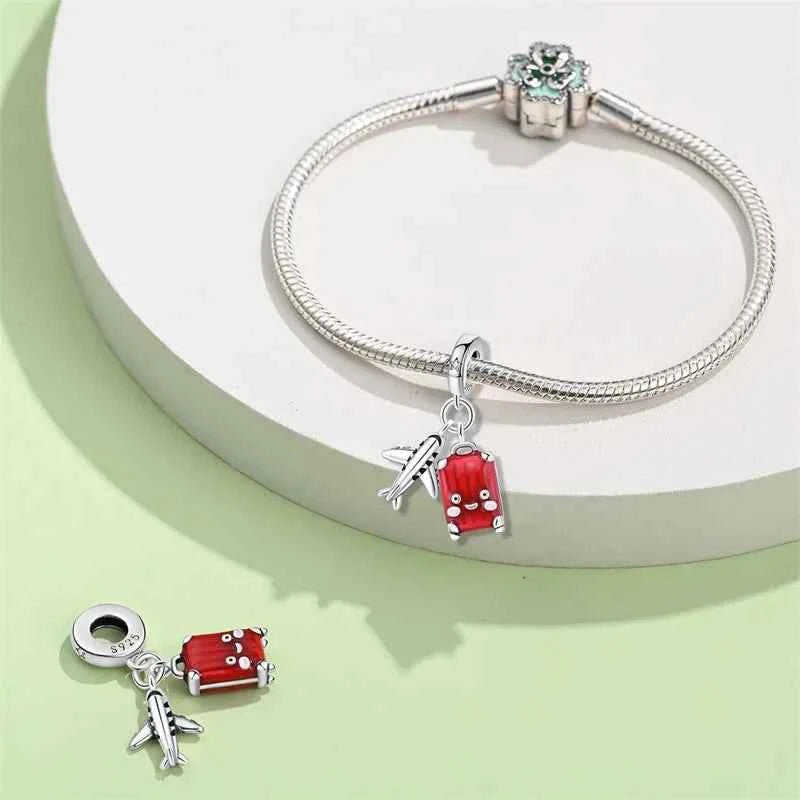 Crimson Horizons Sterling Silver Travel Charm