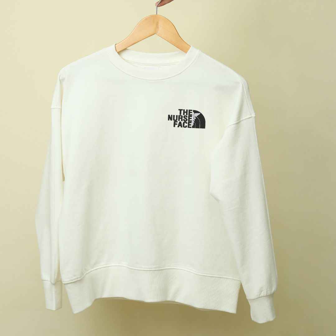 Crewneck "The Nurse Face" brodé