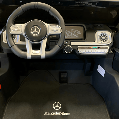24V Exclusive Matte Black Mercedes Benz G63 2-Seater 4x4 Kids' Ride-on SUV W/ EVA Wheels, Leather Seats, Light-up Logo, BT & RC